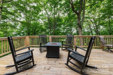 Tucked into the gated Wolf Laurel community at 4,300 feet on Wolf Laurel Country Club in North Carolina - for sale on GolfHomes.com, golf home, golf lot