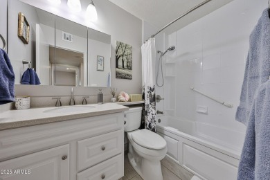 This updated home near the Sun Dial Recreation Center features a on Sun City Lakes West and East in Arizona - for sale on GolfHomes.com, golf home, golf lot