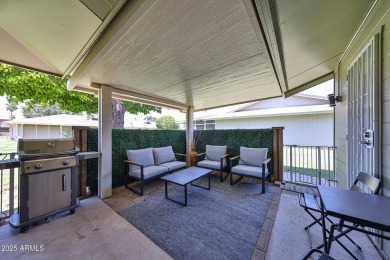 This updated home near the Sun Dial Recreation Center features a on Sun City Lakes West and East in Arizona - for sale on GolfHomes.com, golf home, golf lot