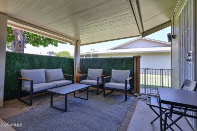 This updated home near the Sun Dial Recreation Center features a on Sun City Lakes West and East in Arizona - for sale on GolfHomes.com, golf home, golf lot