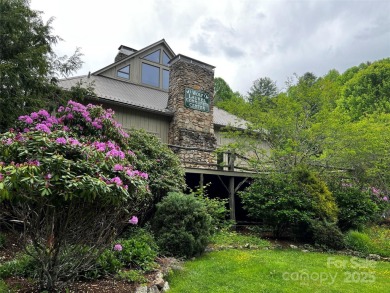 Tucked into the gated Wolf Laurel community at 4,300 feet on Wolf Laurel Country Club in North Carolina - for sale on GolfHomes.com, golf home, golf lot
