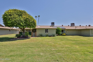 This updated home near the Sun Dial Recreation Center features a on Sun City Lakes West and East in Arizona - for sale on GolfHomes.com, golf home, golf lot