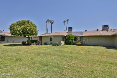 This updated home near the Sun Dial Recreation Center features a on Sun City Lakes West and East in Arizona - for sale on GolfHomes.com, golf home, golf lot