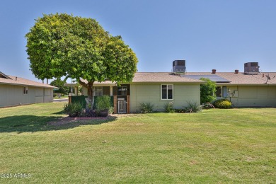 This updated home near the Sun Dial Recreation Center features a on Sun City Lakes West and East in Arizona - for sale on GolfHomes.com, golf home, golf lot