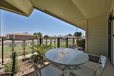 This updated home near the Sun Dial Recreation Center features a on Sun City Lakes West and East in Arizona - for sale on GolfHomes.com, golf home, golf lot