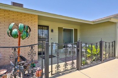 This updated home near the Sun Dial Recreation Center features a on Sun City Lakes West and East in Arizona - for sale on GolfHomes.com, golf home, golf lot