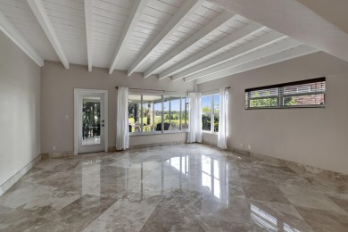 Exceptional Modern Mid-Century home situated directly on the on Lake Worth Municipal Golf Course in Florida - for sale on GolfHomes.com, golf home, golf lot