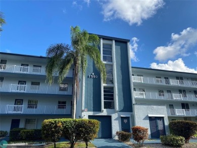 Corner 2-bedroom 2-bathroom unit with elevator and 2nd floor on Oriole Golf and Tennis Club in Florida - for sale on GolfHomes.com, golf home, golf lot