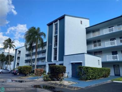 Corner 2-bedroom 2-bathroom unit with elevator and 2nd floor on Oriole Golf and Tennis Club in Florida - for sale on GolfHomes.com, golf home, golf lot