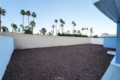 Step into this sun-filled 2 bedroom, 2 bath retreat where modern on Date Palm Country Club in California - for sale on GolfHomes.com, golf home, golf lot
