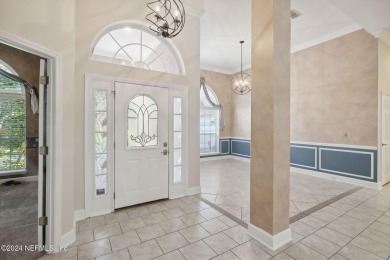 Step into luxury at this beautifully updated brick Pool home on Jacksonville Golf and Country Club in Florida - for sale on GolfHomes.com, golf home, golf lot