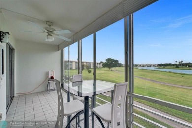Ready to retire or just enjoy a nice vacation? Welcome to on Wynmoor Golf Course in Florida - for sale on GolfHomes.com, golf home, golf lot