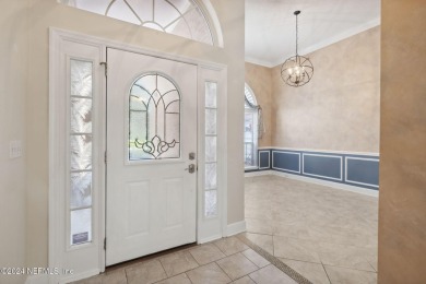 Step into luxury at this beautifully updated brick Pool home on Jacksonville Golf and Country Club in Florida - for sale on GolfHomes.com, golf home, golf lot