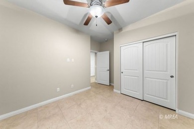 Situated along the 5th fairway and green of the Canyons Course on The Oasis Golf Club in Nevada - for sale on GolfHomes.com, golf home, golf lot