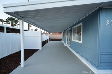 Step into this sun-filled 2 bedroom, 2 bath retreat where modern on Date Palm Country Club in California - for sale on GolfHomes.com, golf home, golf lot