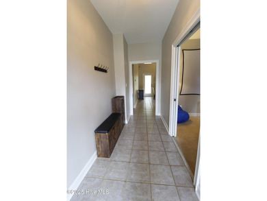 This stunning 4 bedroom, 3 bath home is a rare find nestled in on Majestic Pines Golf and Country Club in North Carolina - for sale on GolfHomes.com, golf home, golf lot