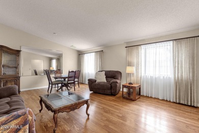 Spacious, thoughtfully updated, and designed for easy living on Briarwood Country Club in Arizona - for sale on GolfHomes.com, golf home, golf lot