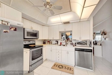 Ready to retire or just enjoy a nice vacation? Welcome to on Wynmoor Golf Course in Florida - for sale on GolfHomes.com, golf home, golf lot