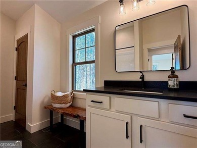 Welcome to this custom-built modern craftsman cabin nestled on White Path Golf Club in Georgia - for sale on GolfHomes.com, golf home, golf lot