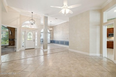 Step into luxury at this beautifully updated brick Pool home on Jacksonville Golf and Country Club in Florida - for sale on GolfHomes.com, golf home, golf lot