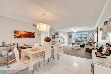Ready to retire or just enjoy a nice vacation? Welcome to on Wynmoor Golf Course in Florida - for sale on GolfHomes.com, golf home, golf lot