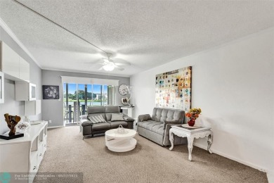 Ready to retire or just enjoy a nice vacation? Welcome to on Wynmoor Golf Course in Florida - for sale on GolfHomes.com, golf home, golf lot