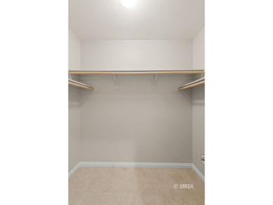 Situated along the 5th fairway and green of the Canyons Course on The Oasis Golf Club in Nevada - for sale on GolfHomes.com, golf home, golf lot