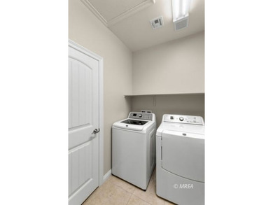 Situated along the 5th fairway and green of the Canyons Course on The Oasis Golf Club in Nevada - for sale on GolfHomes.com, golf home, golf lot