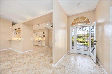 Beautifully updated 3-bedroom, 2-bath split-floor-plan pool home on Oyster Creek Golf Club in Florida - for sale on GolfHomes.com, golf home, golf lot