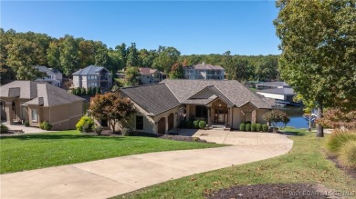 Nestled on a gentle lot in the coveted Porto Cima community on The Club At Porto Cima in Missouri - for sale on GolfHomes.com, golf home, golf lot