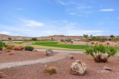 Situated along the 5th fairway and green of the Canyons Course on The Oasis Golf Club in Nevada - for sale on GolfHomes.com, golf home, golf lot
