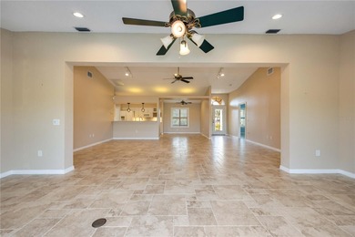 Beautifully updated 3-bedroom, 2-bath split-floor-plan pool home on Oyster Creek Golf Club in Florida - for sale on GolfHomes.com, golf home, golf lot