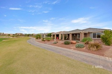 Situated along the 5th fairway and green of the Canyons Course on The Oasis Golf Club in Nevada - for sale on GolfHomes.com, golf home, golf lot