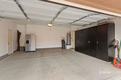 Situated along the 5th fairway and green of the Canyons Course on The Oasis Golf Club in Nevada - for sale on GolfHomes.com, golf home, golf lot