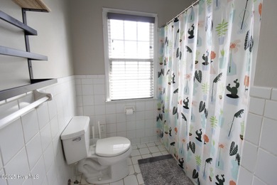 This stunning 4 bedroom, 3 bath home is a rare find nestled in on Majestic Pines Golf and Country Club in North Carolina - for sale on GolfHomes.com, golf home, golf lot