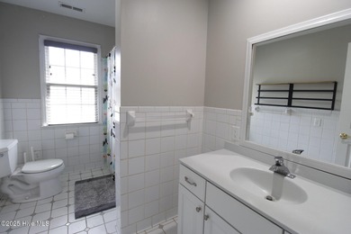 This stunning 4 bedroom, 3 bath home is a rare find nestled in on Majestic Pines Golf and Country Club in North Carolina - for sale on GolfHomes.com, golf home, golf lot