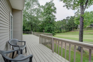 As you arrive at 208 Pebble Beach, the meticulously manicured on Diamondhead Golf and Country Club in Arkansas - for sale on GolfHomes.com, golf home, golf lot