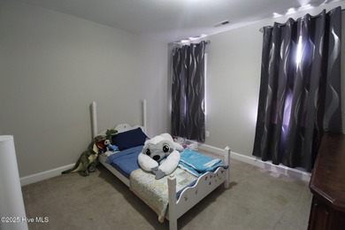 This stunning 4 bedroom, 3 bath home is a rare find nestled in on Majestic Pines Golf and Country Club in North Carolina - for sale on GolfHomes.com, golf home, golf lot