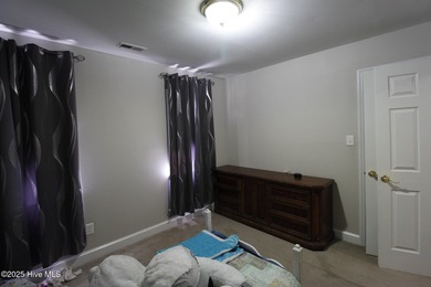 This stunning 4 bedroom, 3 bath home is a rare find nestled in on Majestic Pines Golf and Country Club in North Carolina - for sale on GolfHomes.com, golf home, golf lot