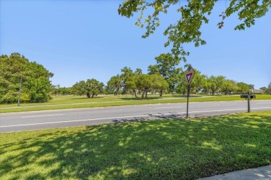 Enjoy the beautiful view of the golf course from your rocking on Southwood Golf Club in Florida - for sale on GolfHomes.com, golf home, golf lot