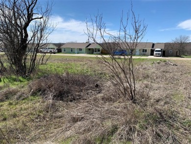 Flat lot ready to build your dream home on it. Near Bridgeport on The Club At Runaway Bay in Texas - for sale on GolfHomes.com, golf home, golf lot