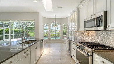 One or more photo(s) has been virtually staged. Behind the gates on TPC Prestancia in Florida - for sale on GolfHomes.com, golf home, golf lot