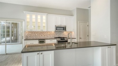 One or more photo(s) has been virtually staged. Behind the gates on TPC Prestancia in Florida - for sale on GolfHomes.com, golf home, golf lot