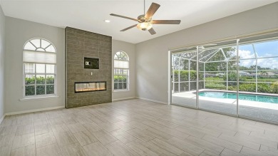 One or more photo(s) has been virtually staged. Behind the gates on TPC Prestancia in Florida - for sale on GolfHomes.com, golf home, golf lot