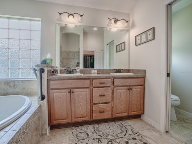 Welcome to this LOVELY LILAC DESIGNER HOME with a GOLF CART on Bella Glade Country Club in Florida - for sale on GolfHomes.com, golf home, golf lot