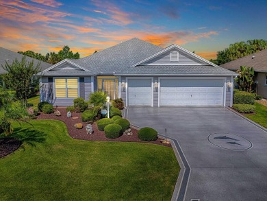 Welcome to this LOVELY LILAC DESIGNER HOME with a GOLF CART on Bella Glade Country Club in Florida - for sale on GolfHomes.com, golf home, golf lot