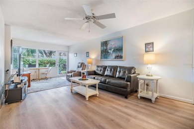 BEAUTIFUL 2 BED / 2 BATH / 1 CARPORT IN THE BEAUTIFUL SEVEN on Seven Springs Golf and Country Club in Florida - for sale on GolfHomes.com, golf home, golf lot