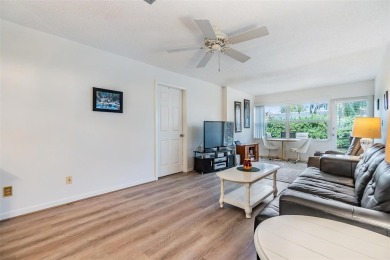 BEAUTIFUL 2 BED / 2 BATH / 1 CARPORT IN THE BEAUTIFUL SEVEN on Seven Springs Golf and Country Club in Florida - for sale on GolfHomes.com, golf home, golf lot