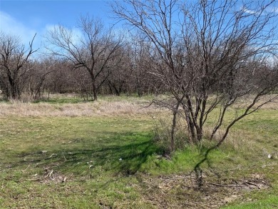 Flat lot ready to build your dream home on it. Near Bridgeport on The Club At Runaway Bay in Texas - for sale on GolfHomes.com, golf home, golf lot