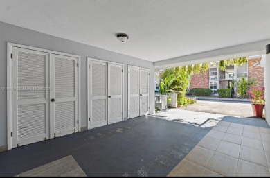 Stunning 3-level with breathtaking golf course and water views on Country Club of Miami in Florida - for sale on GolfHomes.com, golf home, golf lot
